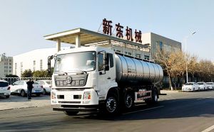东风天锦16吨一体拉奶罐车发往安徽淮南